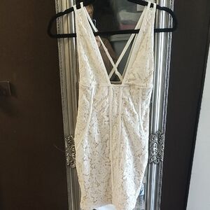 Tobi Cream Garment Label with Black Logo